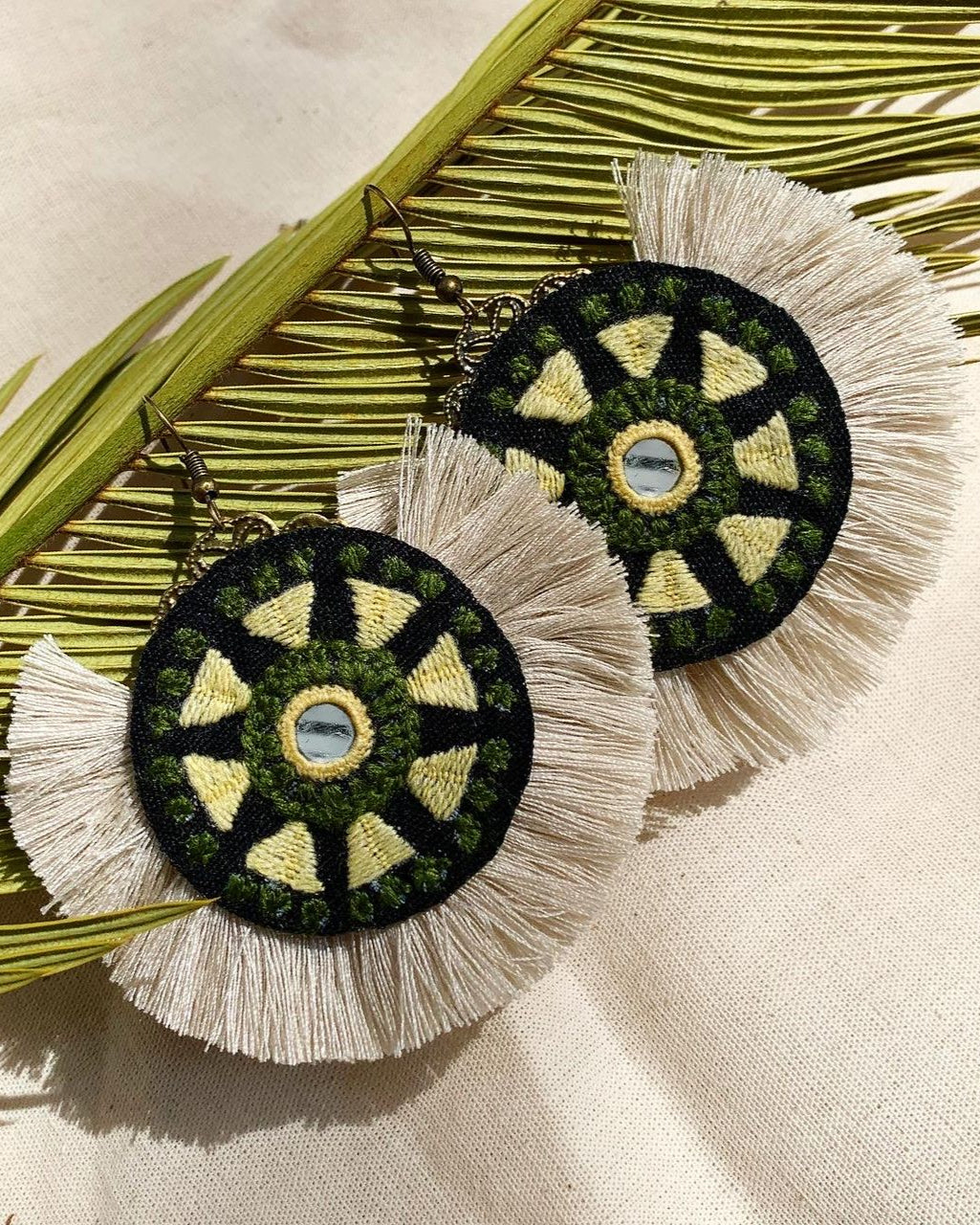 Earrings with mirror works