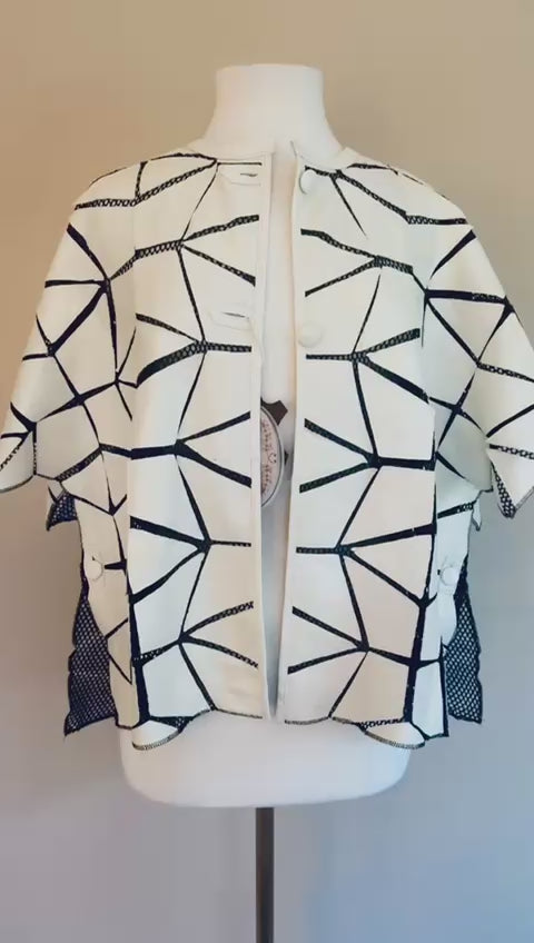 Load video: HAURRA BOLERO JACKET WHITE